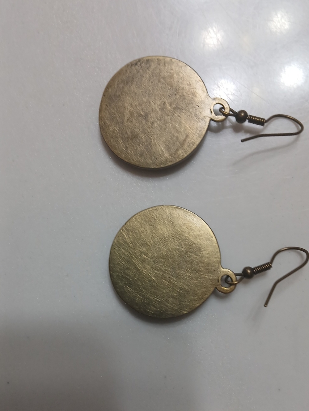 Michael Kors round logo dangle earrings feature the brand's iconic "MK" monogram - Picture 5 of 8